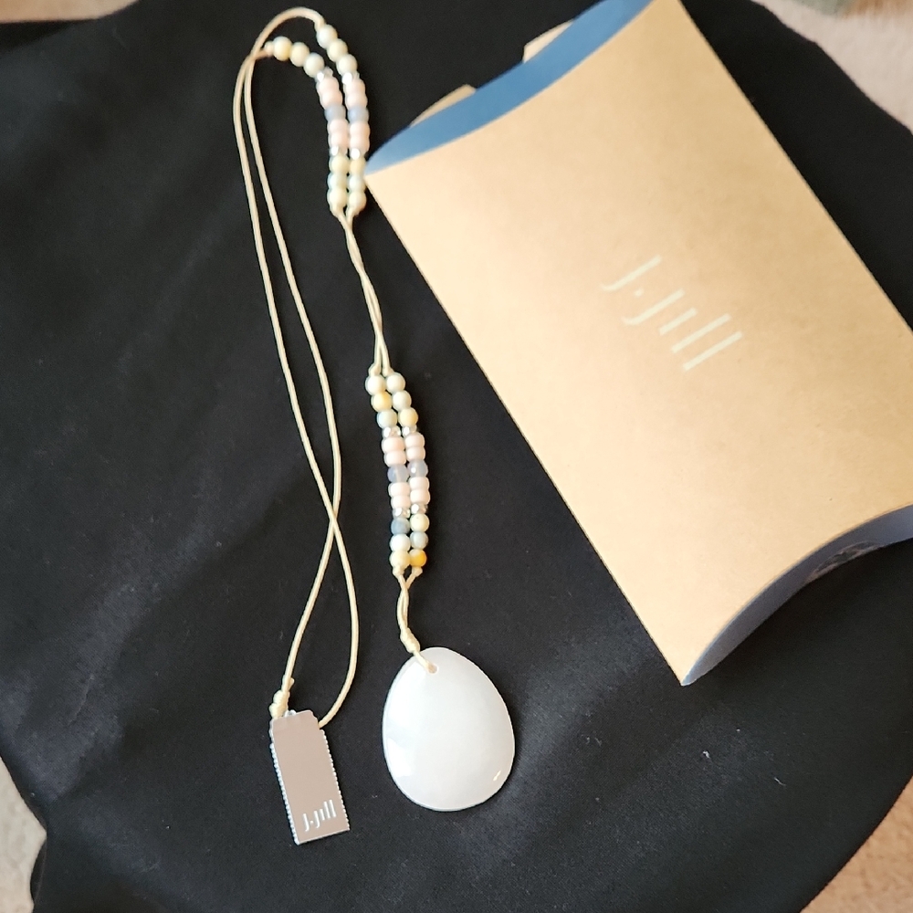 Elegant Beaded Necklace with White Pendant
